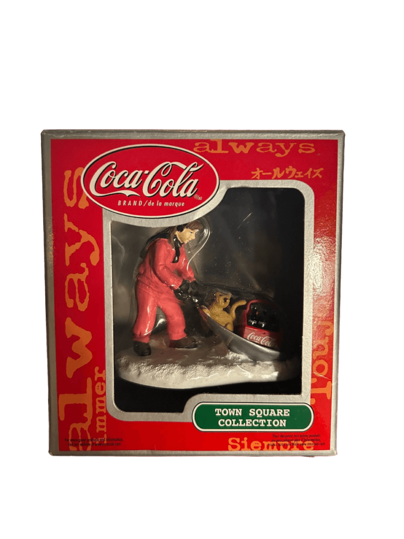 coca cola town square collection girl with cat and sled